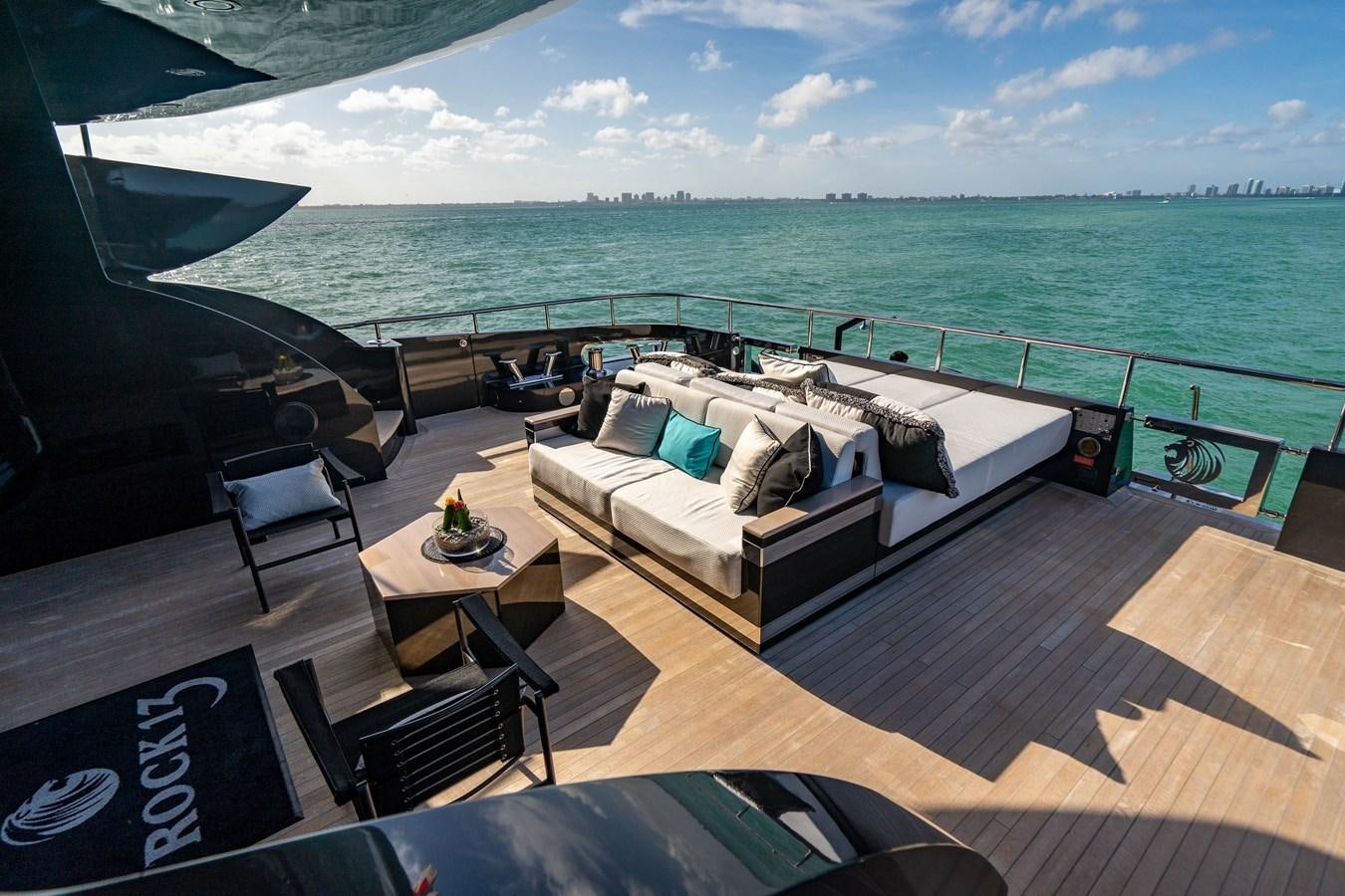 a balcony overlooking the ocean aboard AQUILA Yacht for Sale