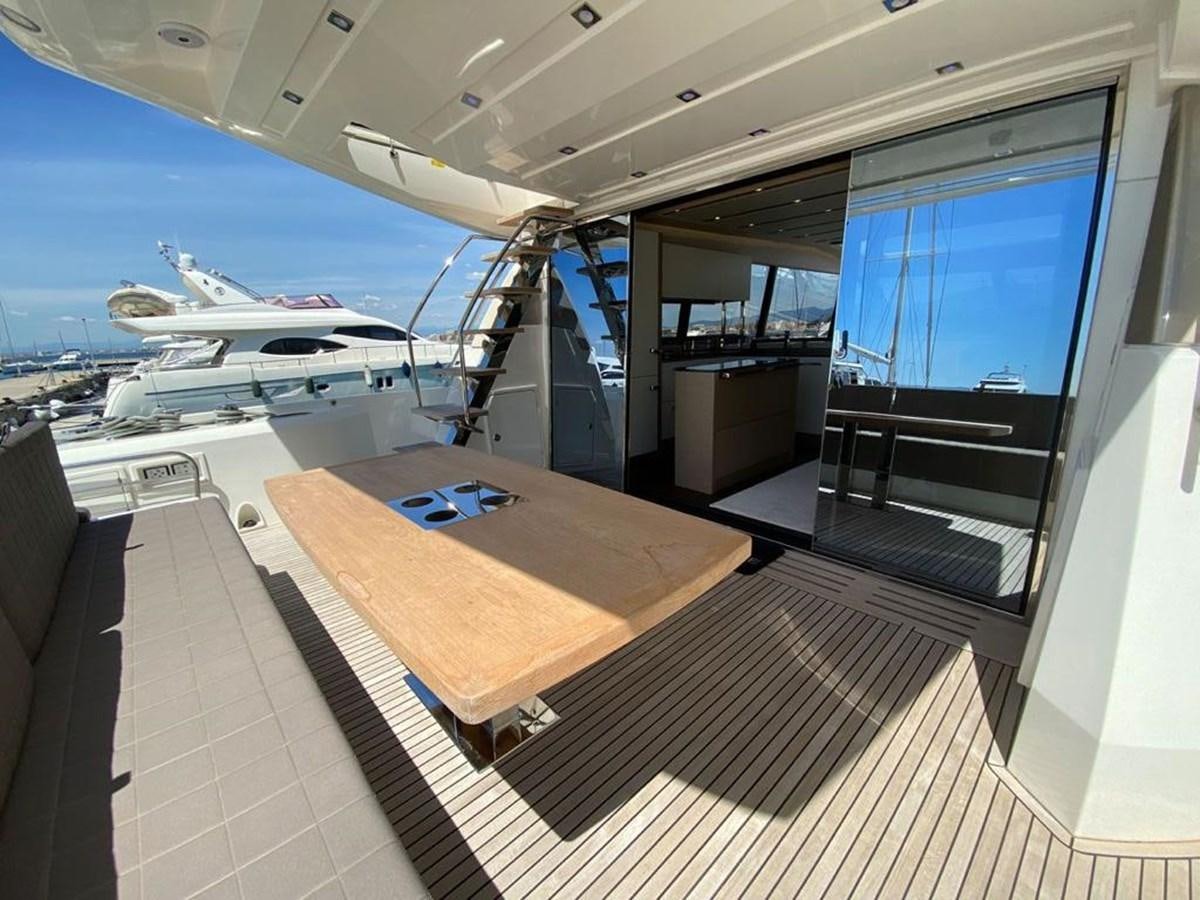 a room with a large window and a view of the water aboard MEIGA Yacht for Sale