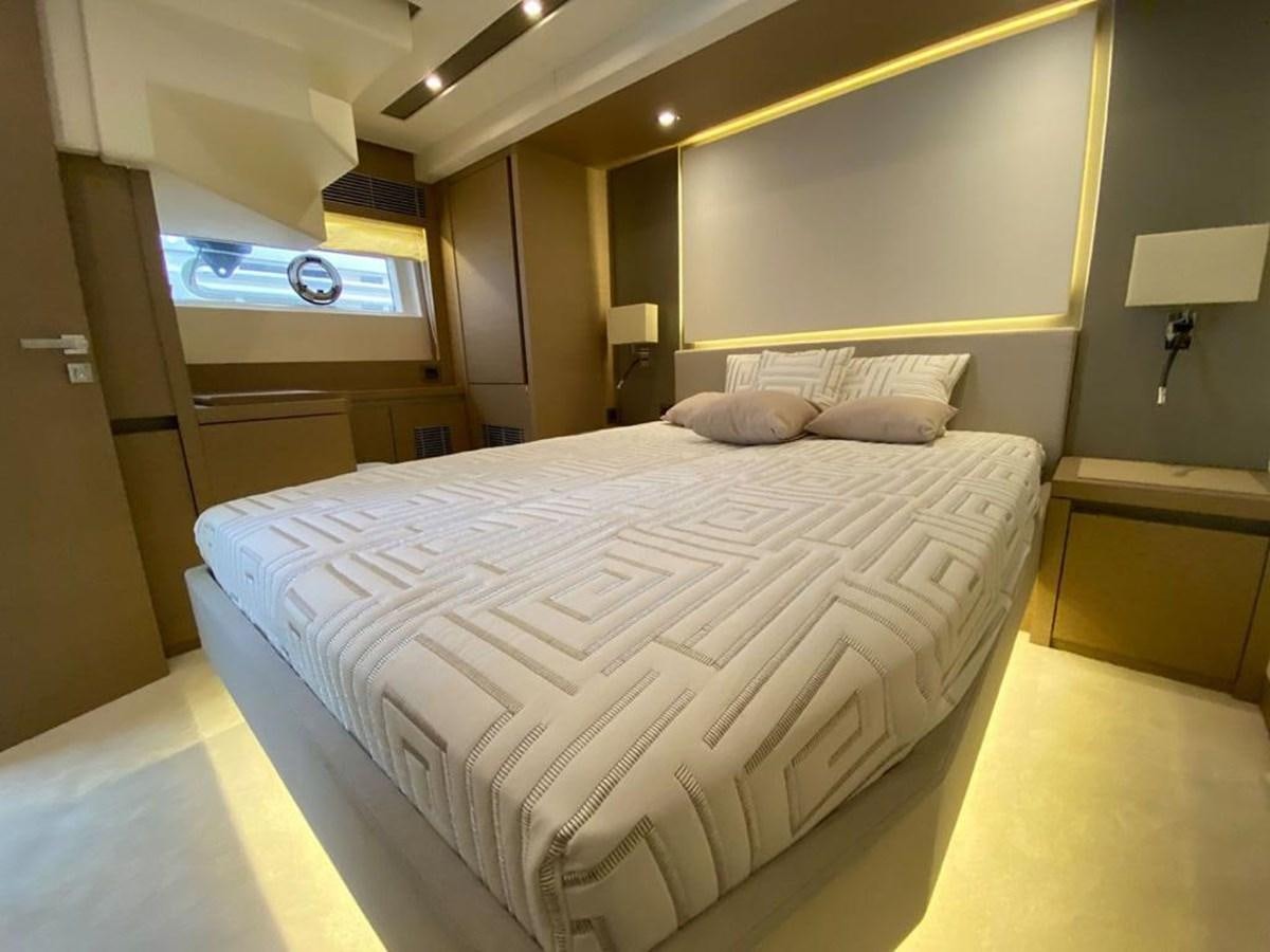a bed in a hotel room aboard MEIGA Yacht for Sale