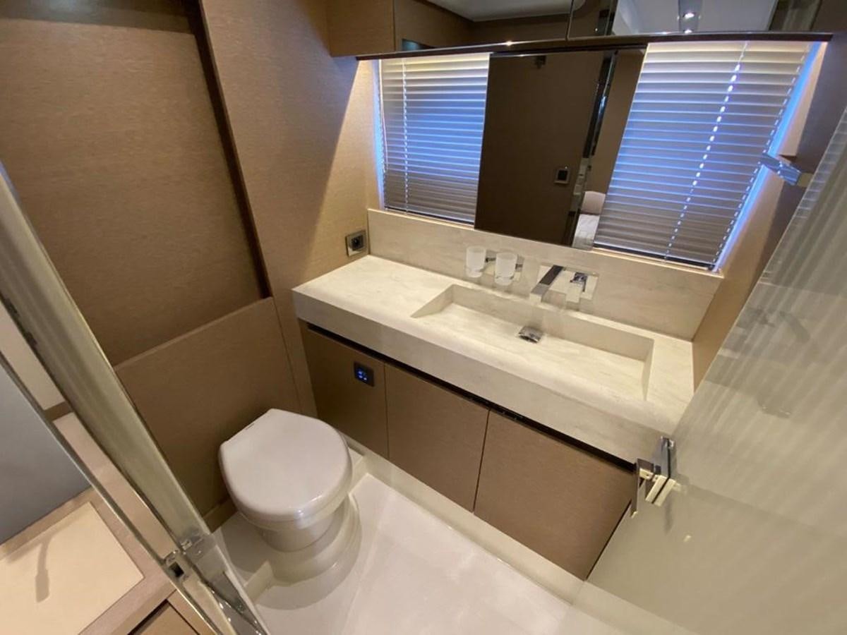 a bathroom with a large mirror aboard MEIGA Yacht for Sale