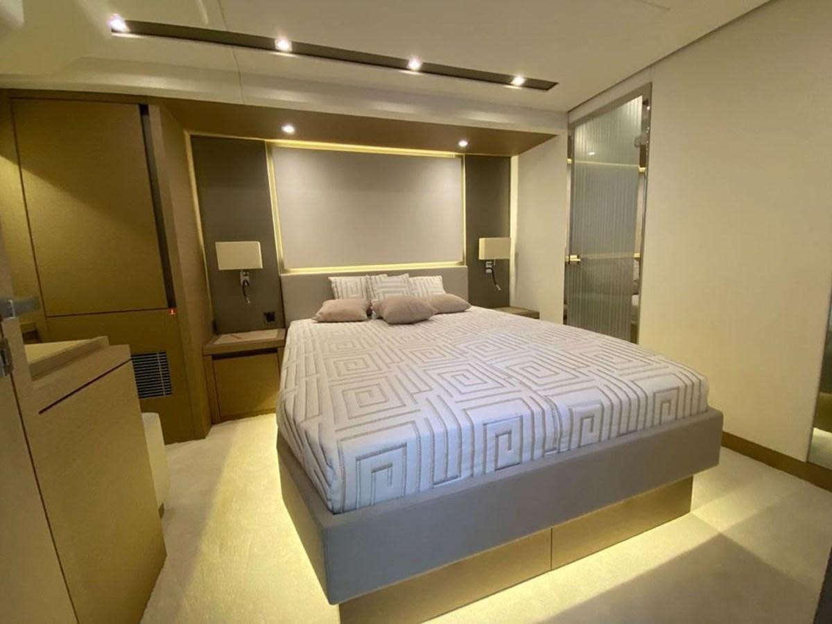 a bed in a room aboard MEIGA Yacht for Sale