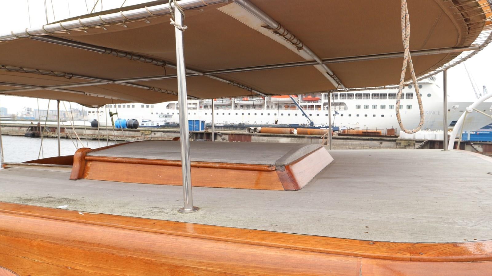 a large white building aboard ARIES Yacht for Sale