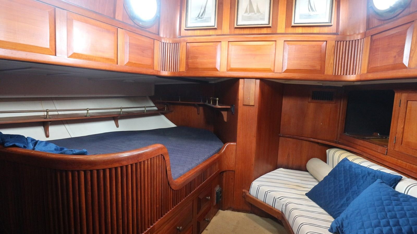 a room with bunk beds aboard ARIES Yacht for Sale