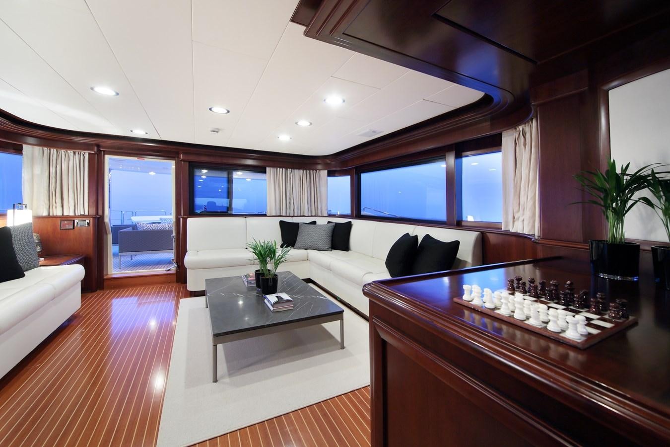 a living room with a large window aboard LADY SOUL Yacht for Sale