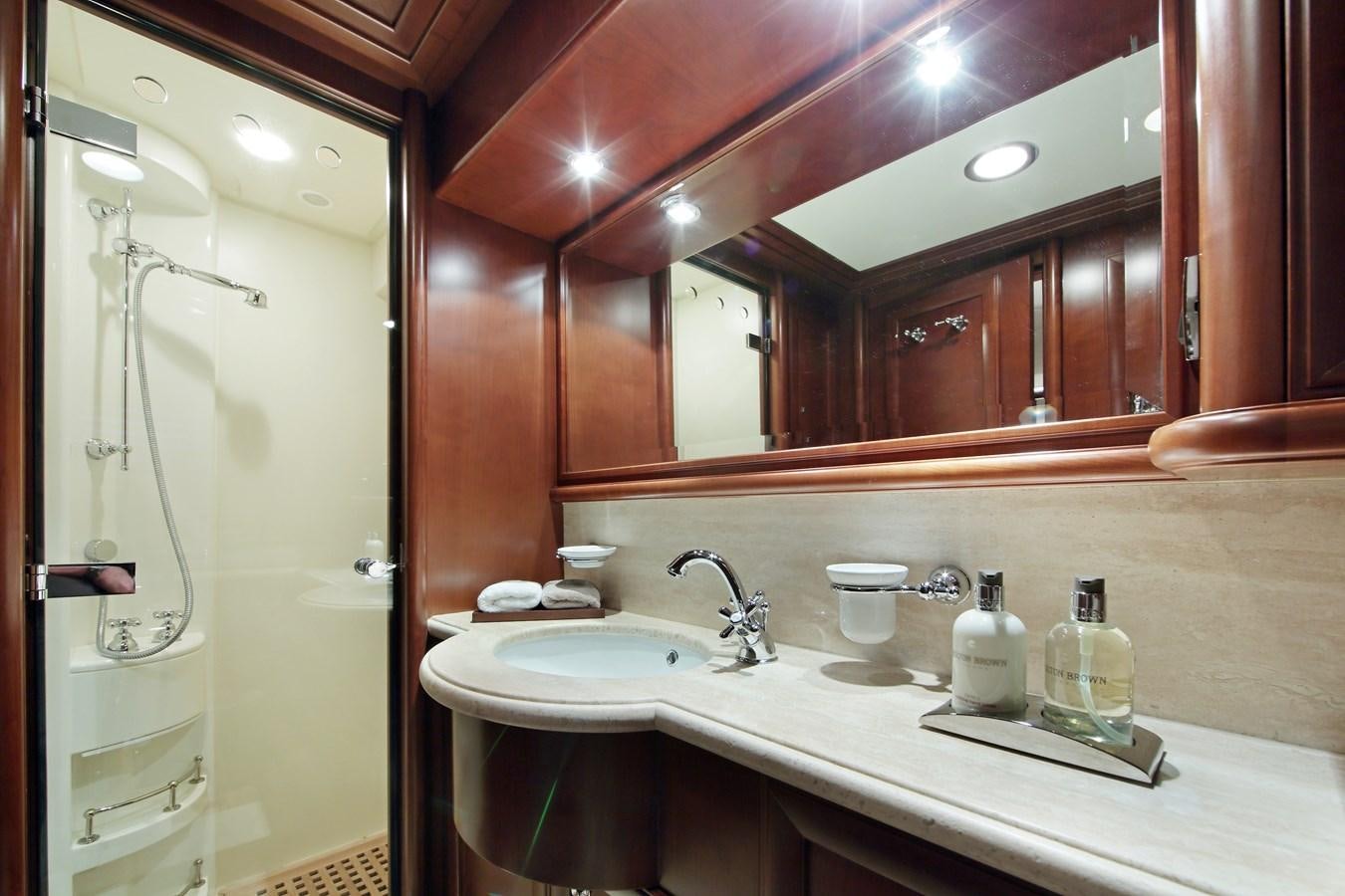 a bathroom with a large mirror aboard LADY SOUL Yacht for Sale