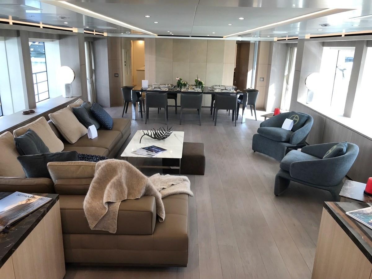 a living room with a couch and a table aboard ALEGRE Yacht for Sale