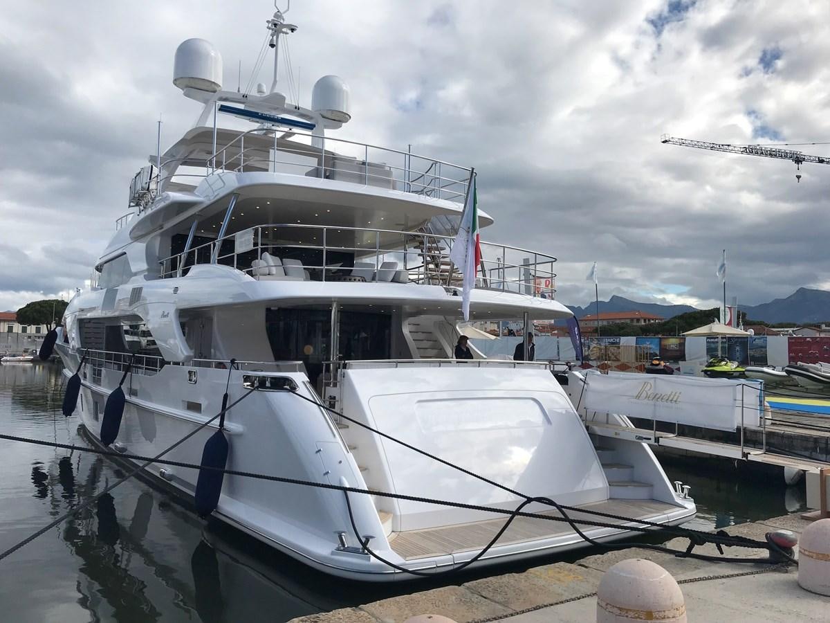 a white boat on a dock aboard ALEGRE Yacht for Sale