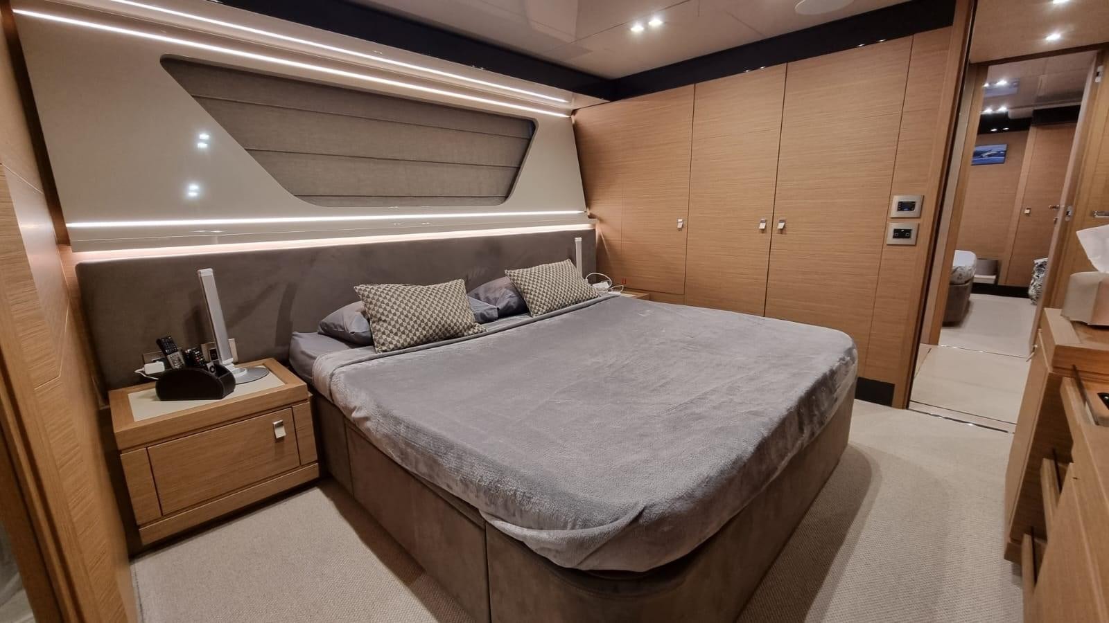 a bed in a room aboard MERIDIANA Yacht for Sale