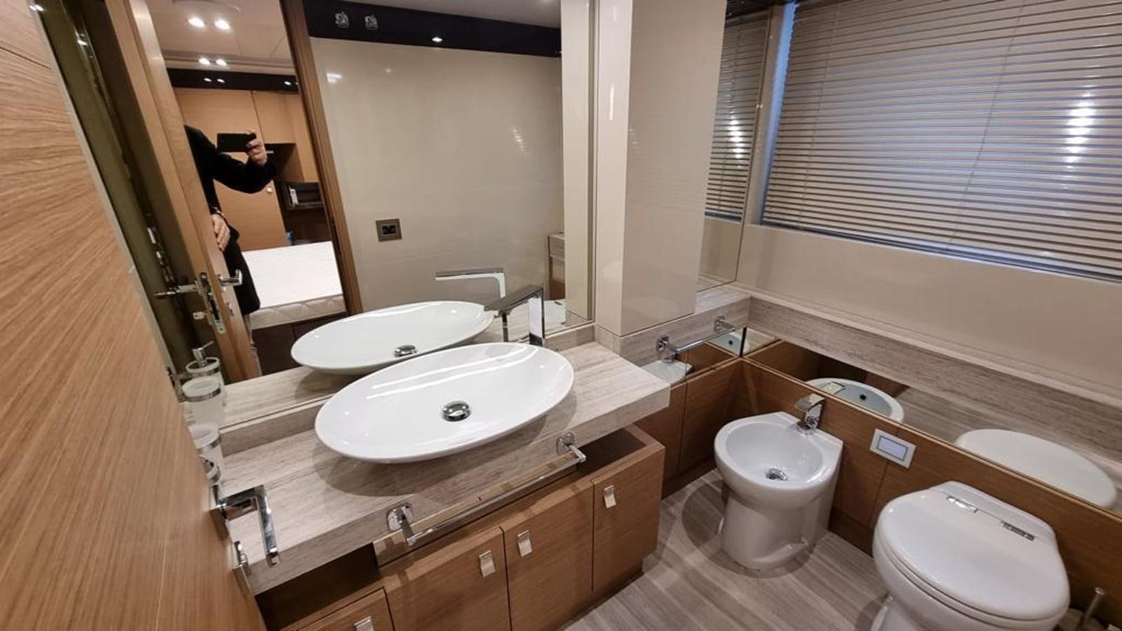 a bathroom with a sink and a toilet aboard MERIDIANA Yacht for Sale