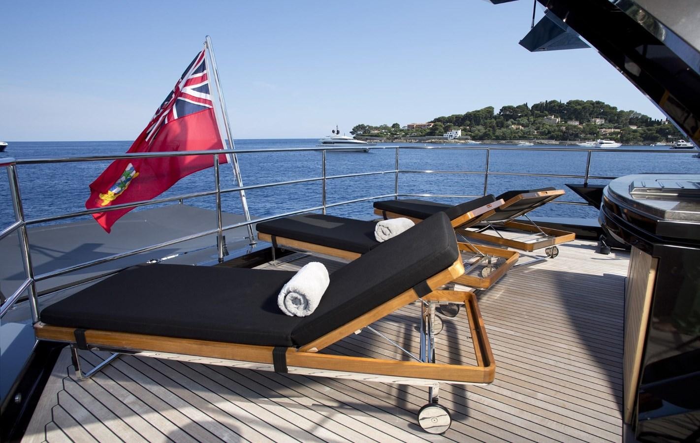 a boat on a deck aboard DEFIANT Yacht for Sale