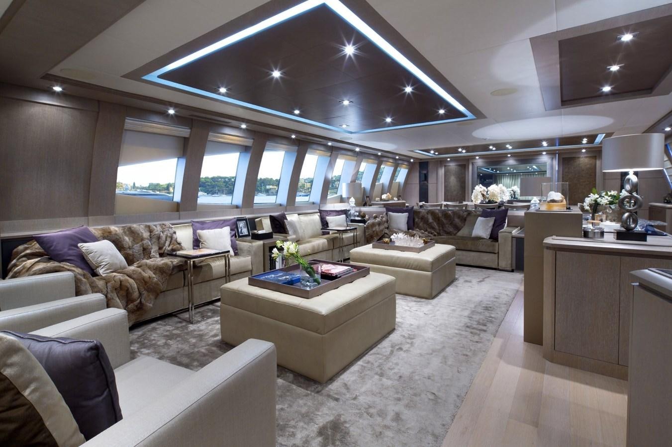 a living room with a large ceiling aboard DEFIANT Yacht for Sale