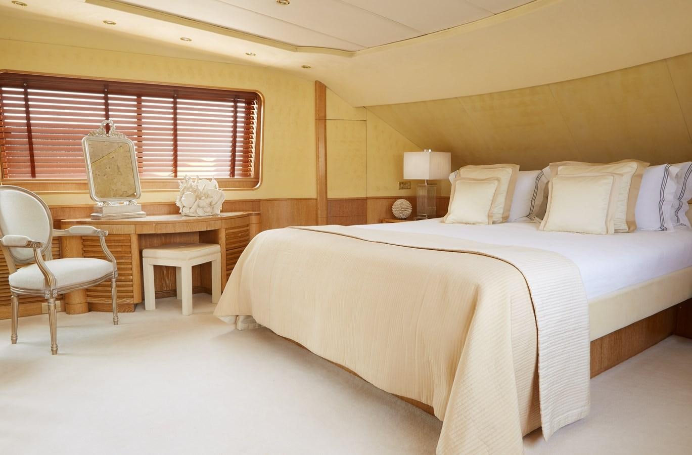 a large bed in a room aboard SEA LADY II Yacht for Sale