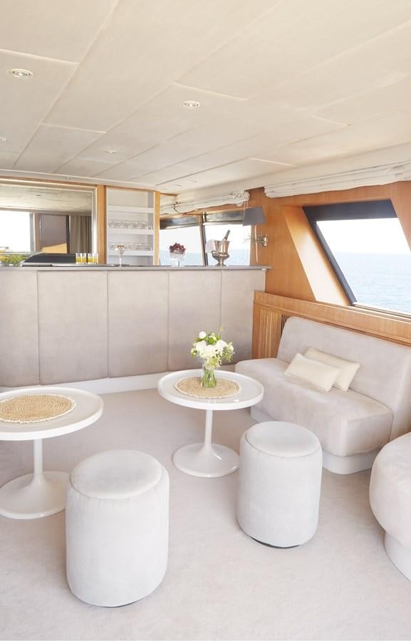 a modern looking living room aboard SEA LADY II Yacht for Sale