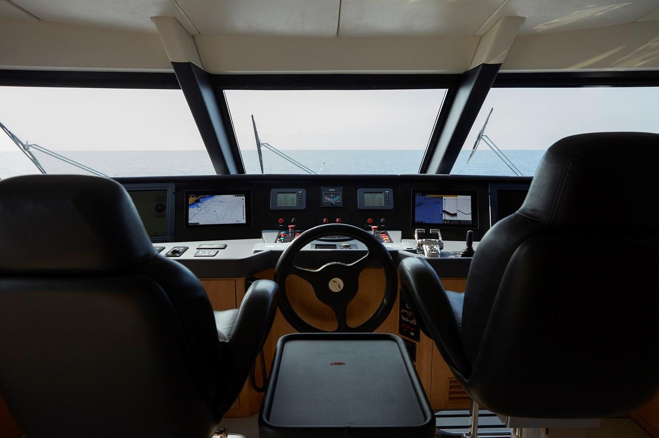 inside of a car aboard SEA LADY II Yacht for Sale