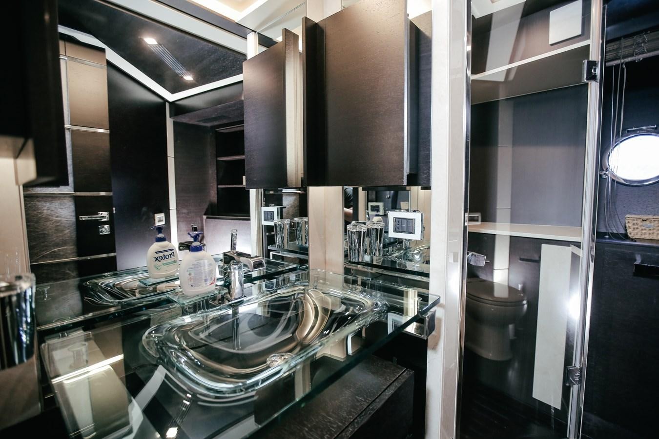 a kitchen with stainless steel appliances aboard PATRONESS Yacht for Sale