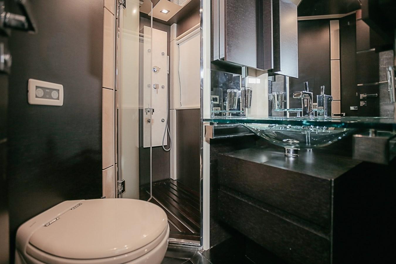 a bathroom with a glass counter aboard PATRONESS Yacht for Sale