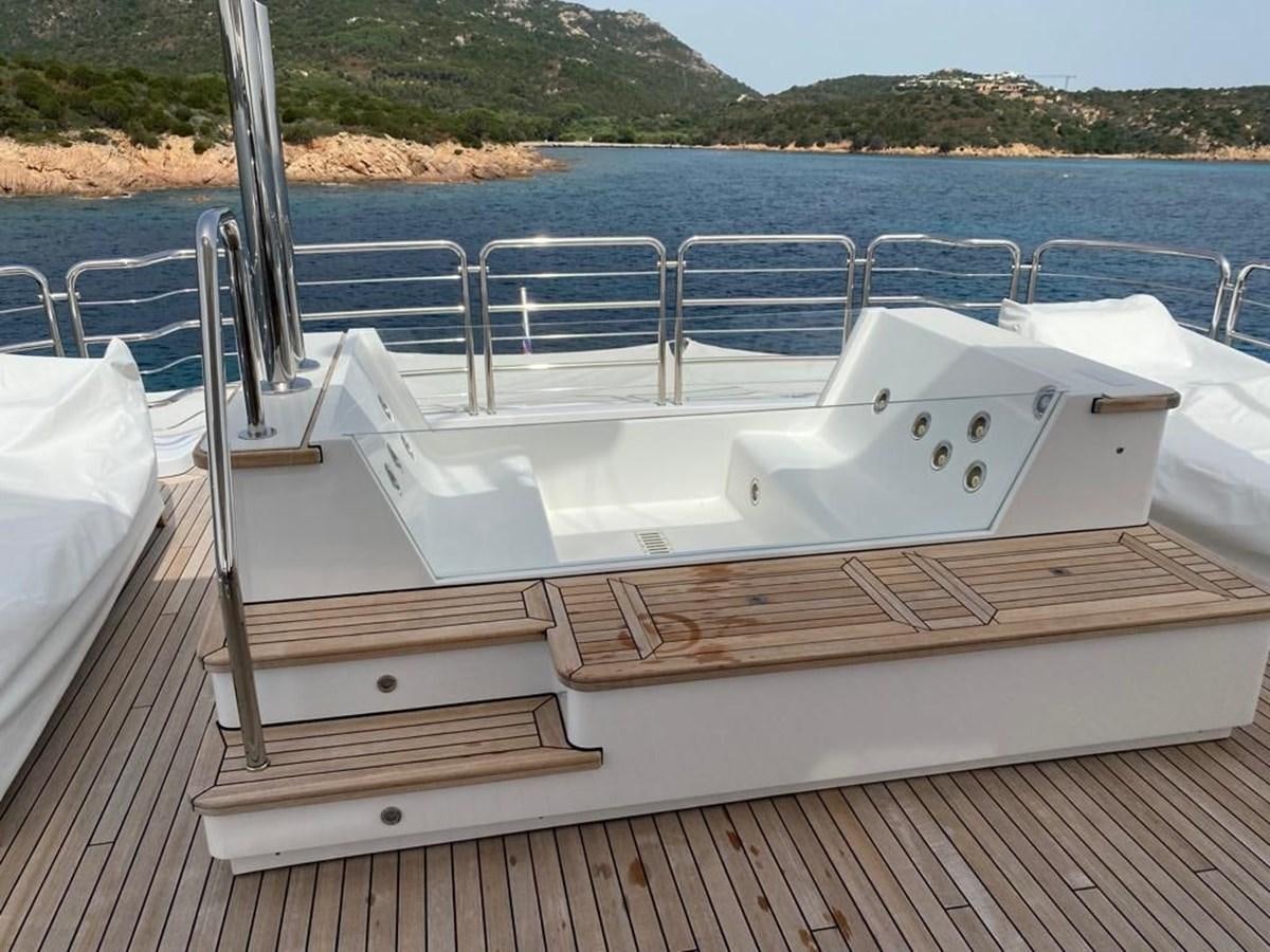 a boat on a deck aboard CLASSIC 121 Yacht for Sale