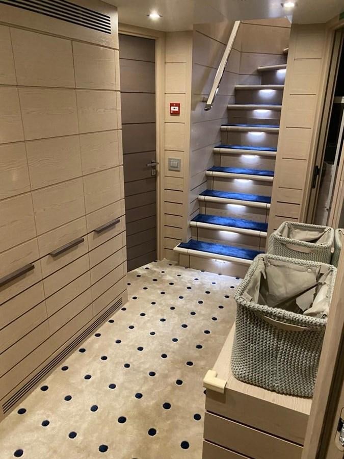 a room with a large shelf aboard CLASSIC 121 Yacht for Sale