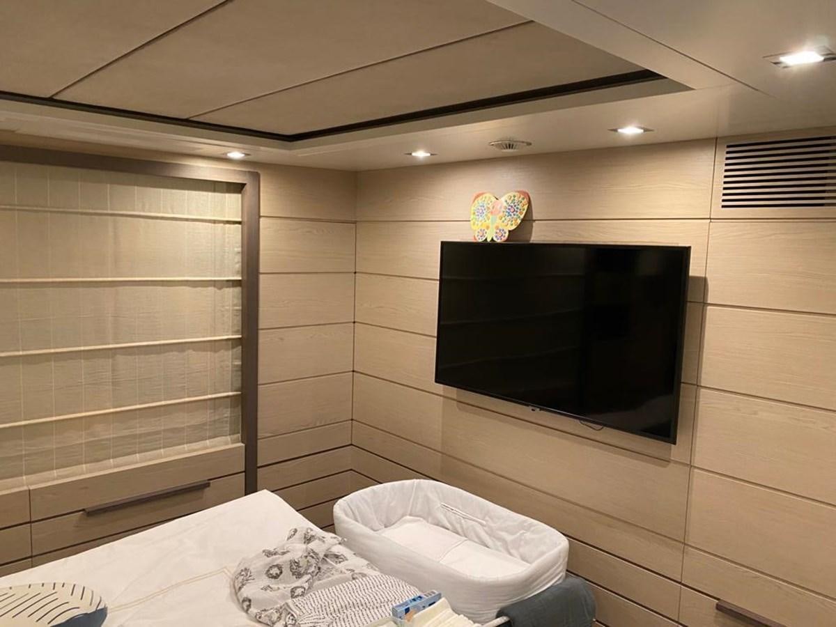 a tv in a room aboard CLASSIC 121 Yacht for Sale