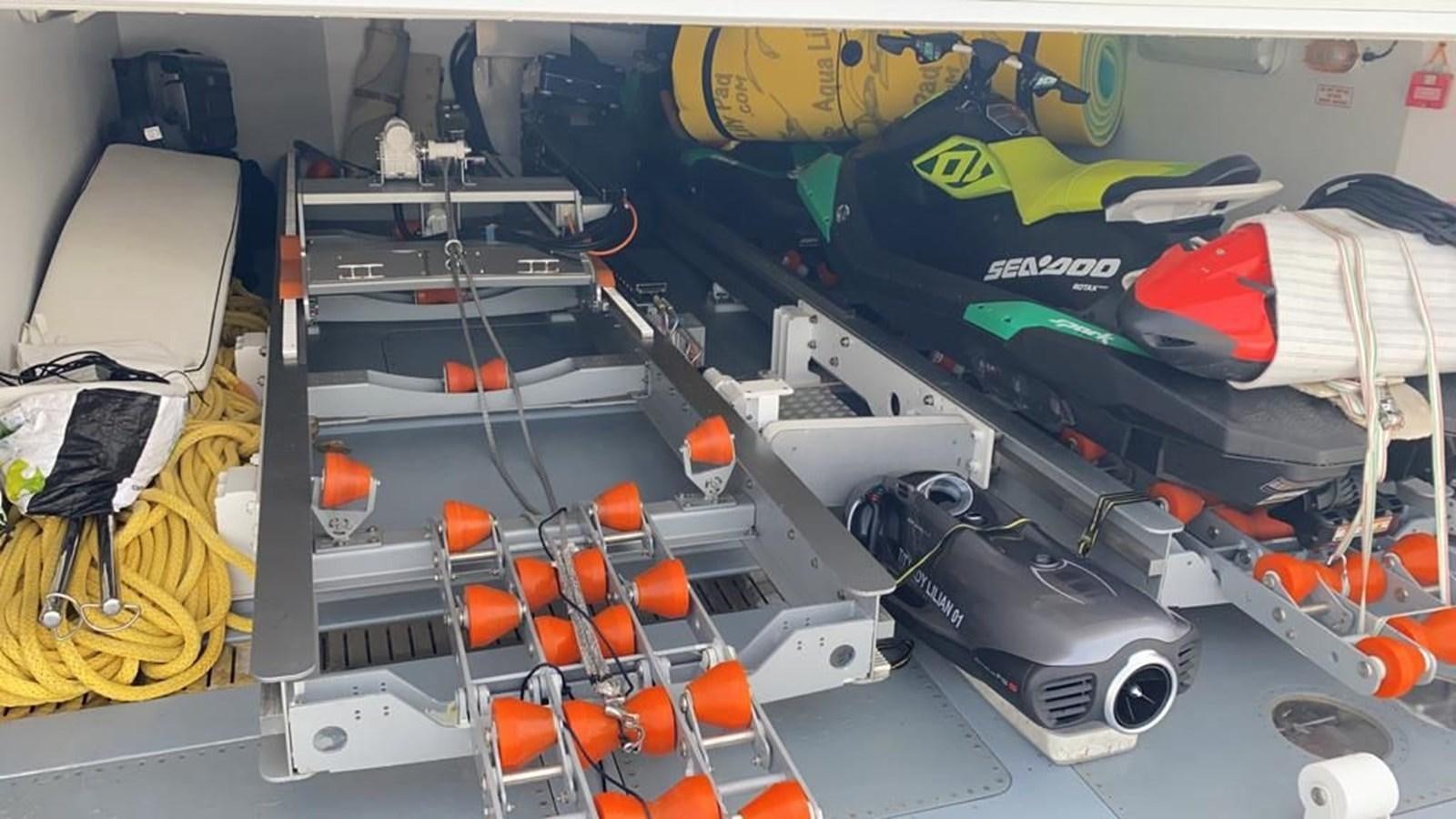 a group of objects on a table aboard CLASSIC 121 Yacht for Sale