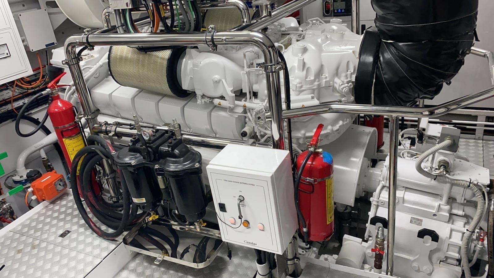 a machine with a large piece of equipment in it aboard CLASSIC 121 Yacht for Sale