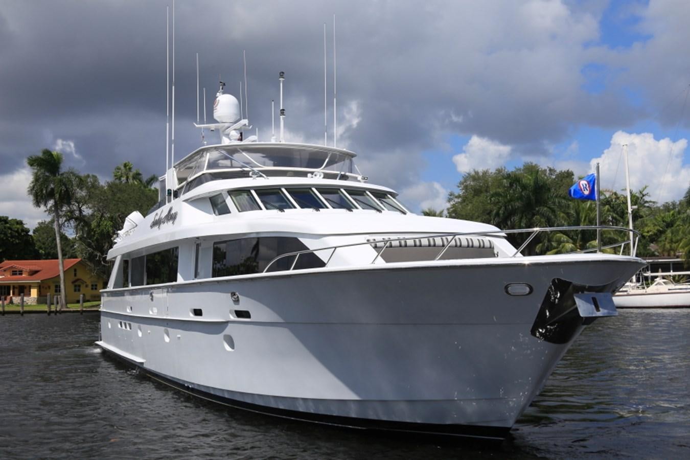 a white yacht in the water aboard SUNDAY MONEY Yacht for Sale