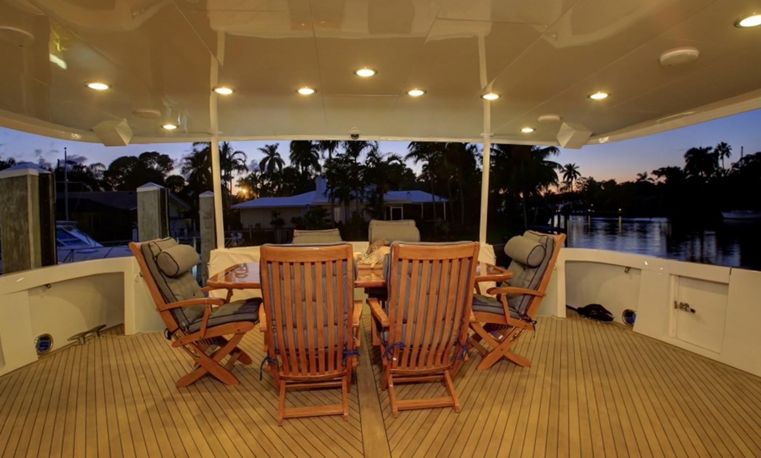 a large room with tables and chairs aboard SUNDAY MONEY Yacht for Sale