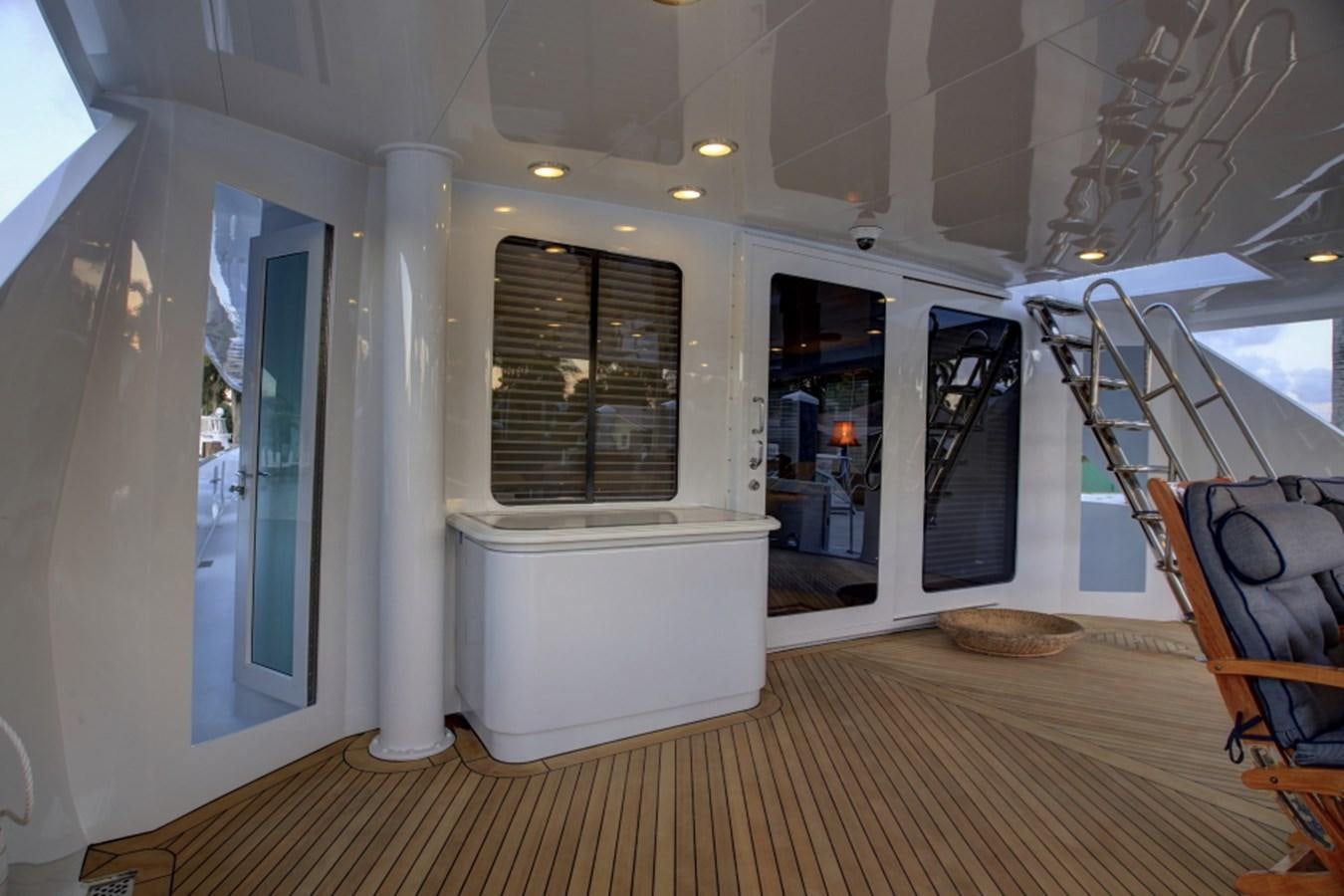 a room with a wood floor and white walls and a wood floor aboard SUNDAY MONEY Yacht for Sale