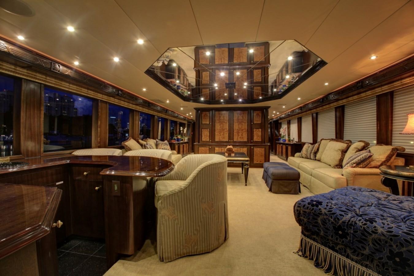 a room with a couch and a table and chairs aboard SUNDAY MONEY Yacht for Sale