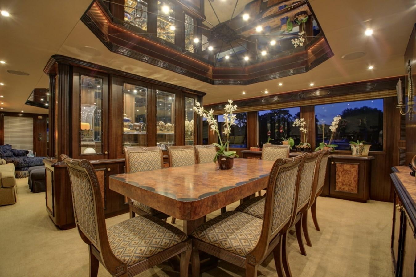 a dining room with a table and chairs aboard SUNDAY MONEY Yacht for Sale