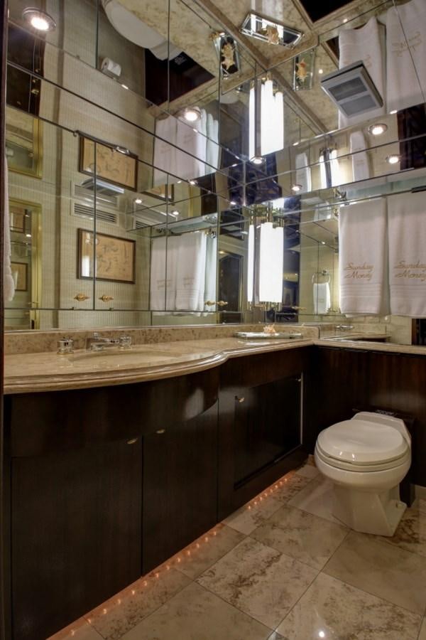 a bathroom with a toilet and sink aboard SUNDAY MONEY Yacht for Sale