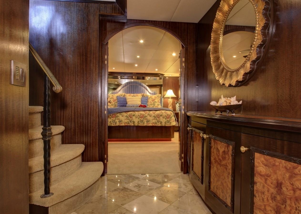 a large room with a bed and a mirror aboard SUNDAY MONEY Yacht for Sale