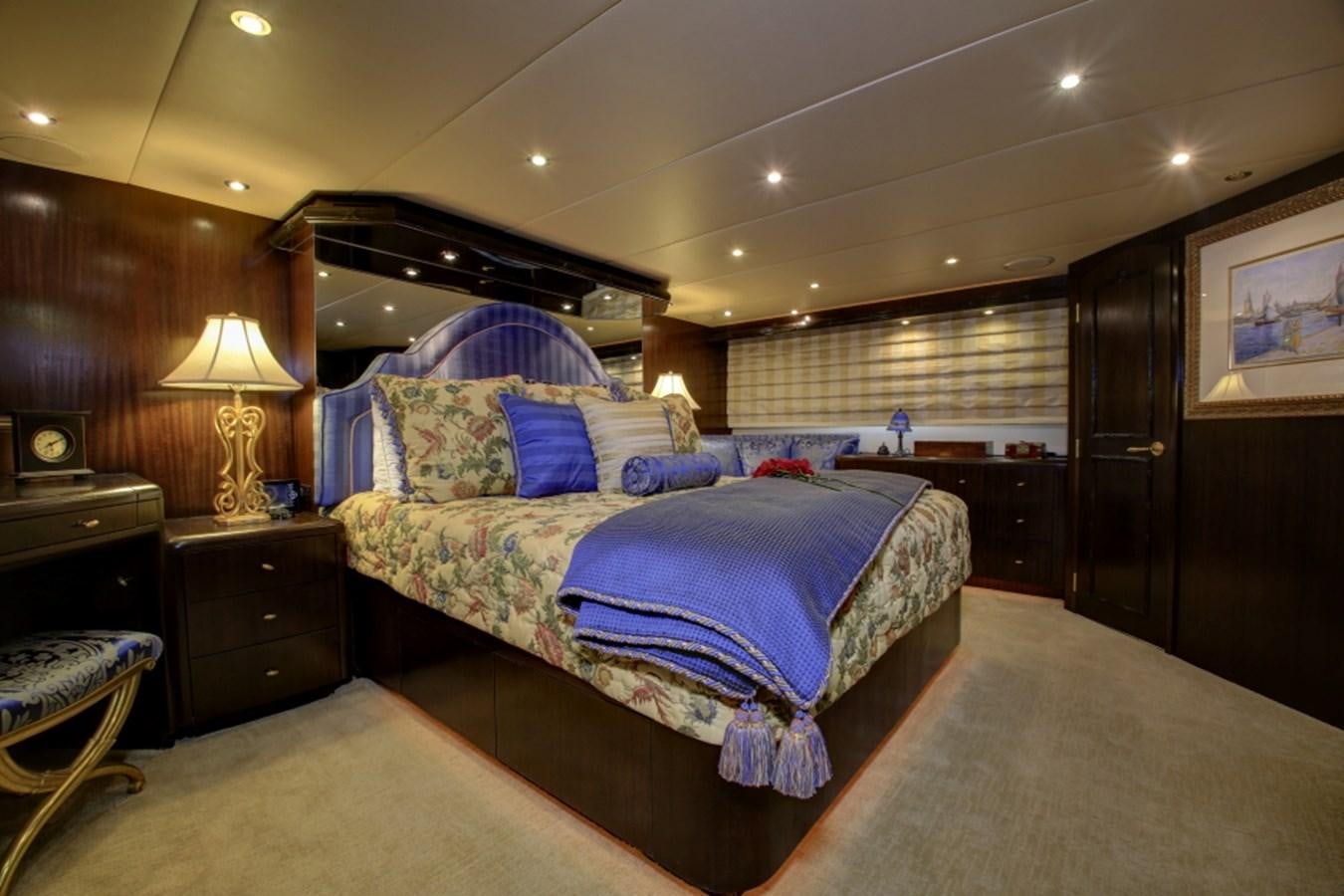 a bedroom with a large bed aboard SUNDAY MONEY Yacht for Sale