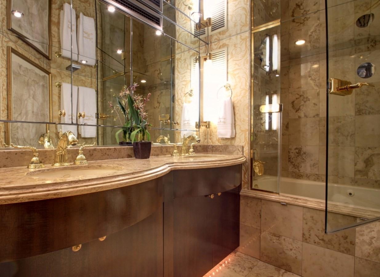 a bathroom with a large mirror aboard SUNDAY MONEY Yacht for Sale