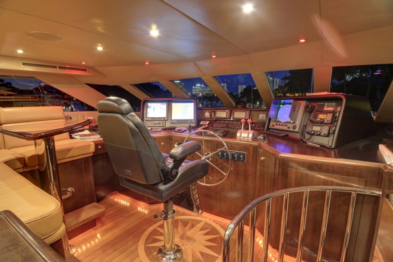 a room with computers and chairs aboard SUNDAY MONEY Yacht for Sale