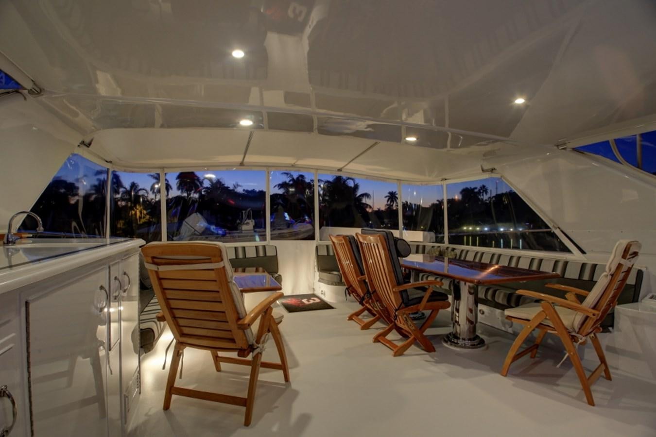 a tent with chairs and tables aboard SUNDAY MONEY Yacht for Sale
