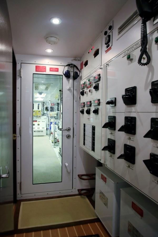 a room with a glass door aboard SUNDAY MONEY Yacht for Sale