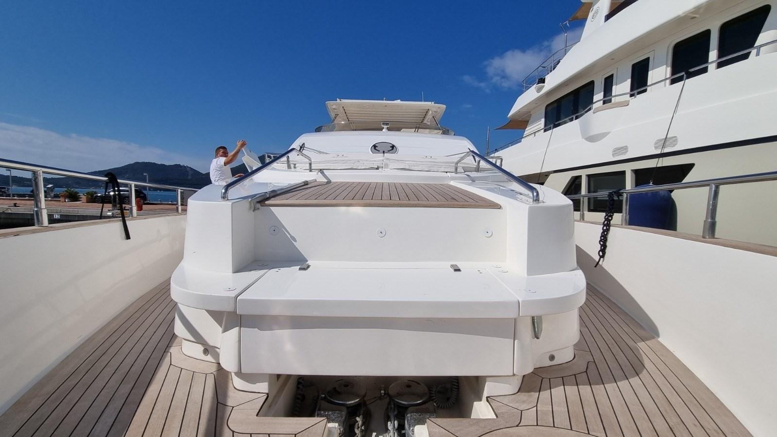 a person standing on a boat aboard RED ROSE Yacht for Sale