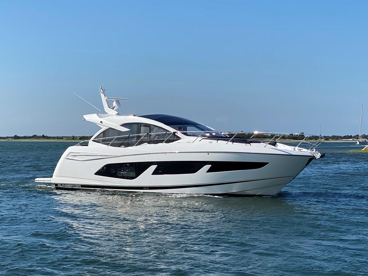 a white yacht on the water aboard LYDIA SWAG Yacht for Sale