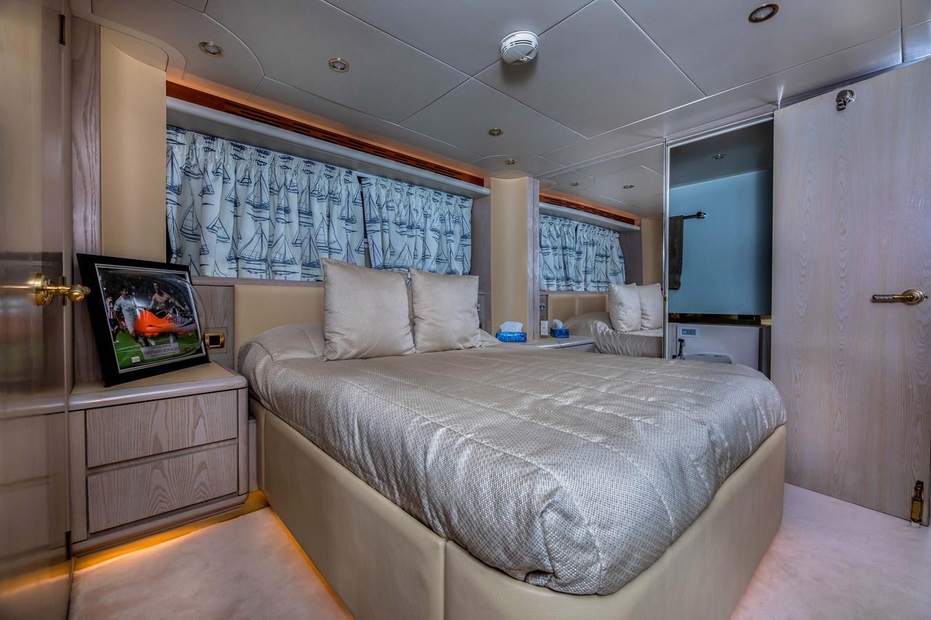 a bed in a room aboard WILDE WHALE Yacht for Sale
