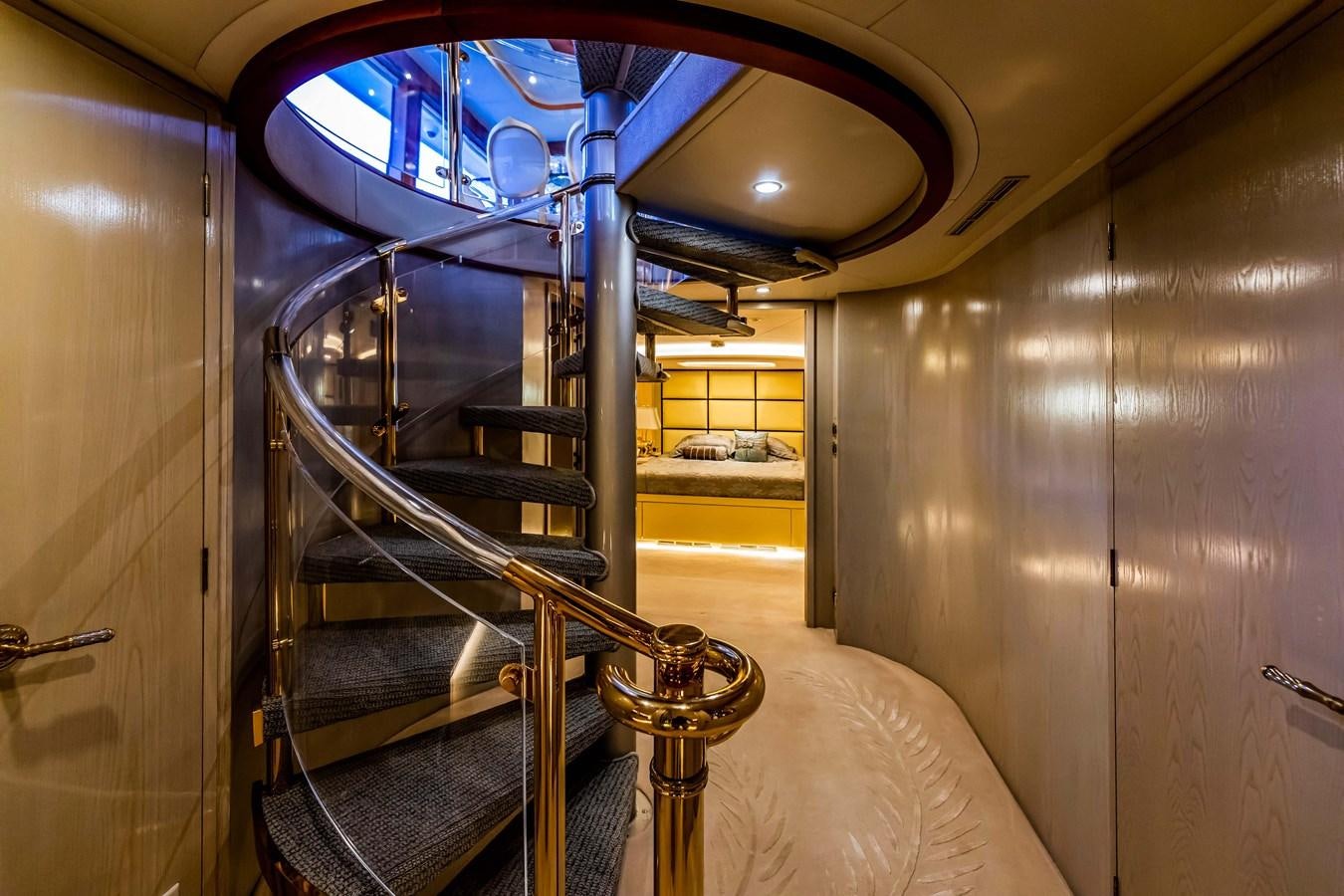 a staircase with glass windows aboard WILDE WHALE Yacht for Sale