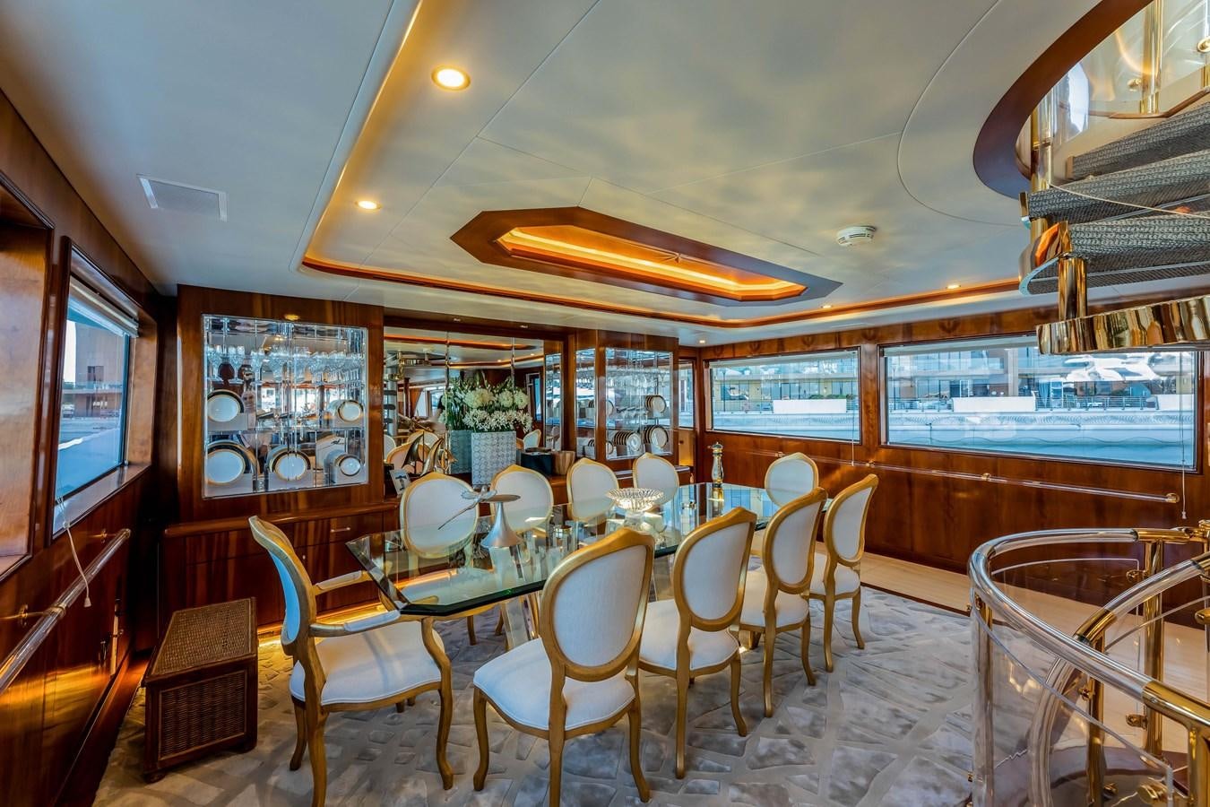 a room with tables and chairs aboard WILDE WHALE Yacht for Sale