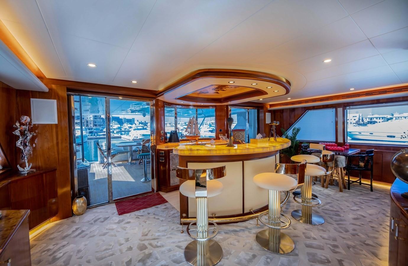 a room with a table and chairs aboard WILDE WHALE Yacht for Sale
