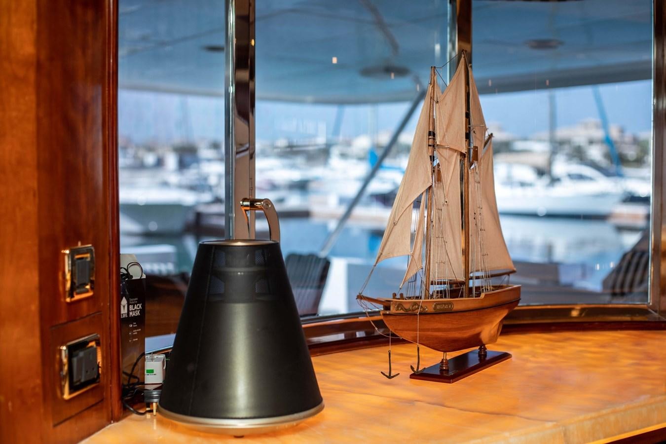 a lamp on a table aboard WILDE WHALE Yacht for Sale