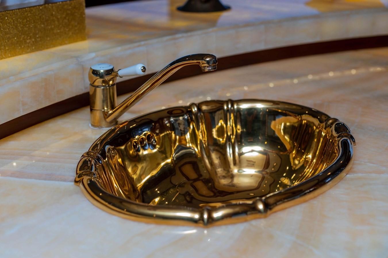 a gold and silver chain aboard WILDE WHALE Yacht for Sale