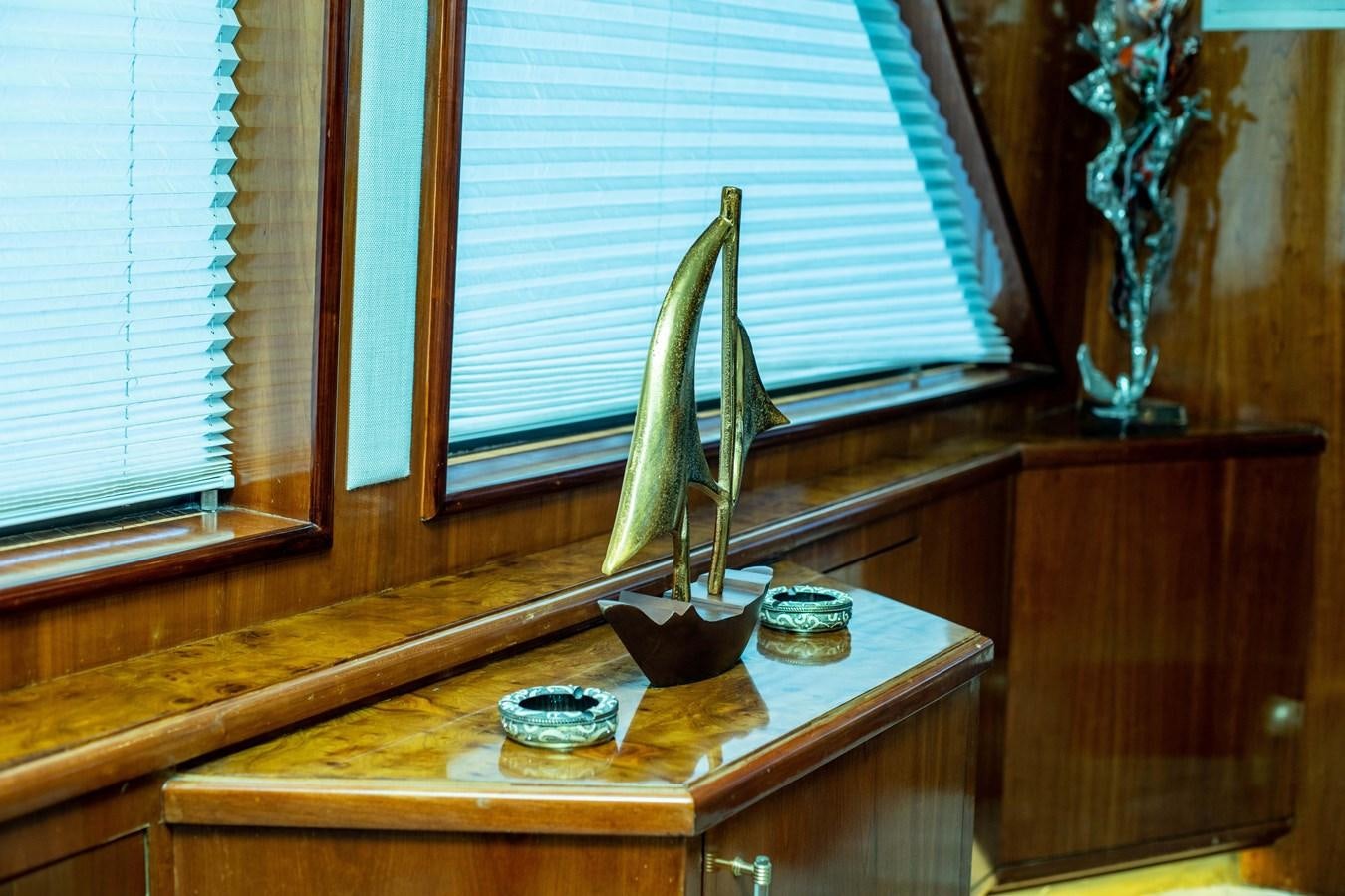 a kitchen counter with a faucet and a window aboard WILDE WHALE Yacht for Sale