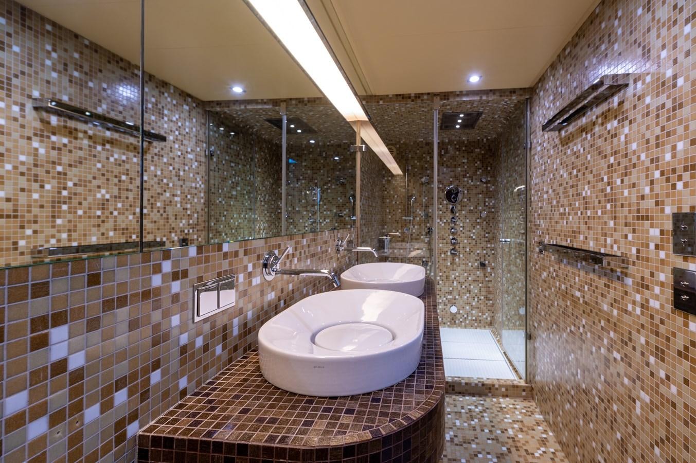 a bathroom with a sink and a mirror aboard BLUE PRINCESS STAR Yacht for Sale