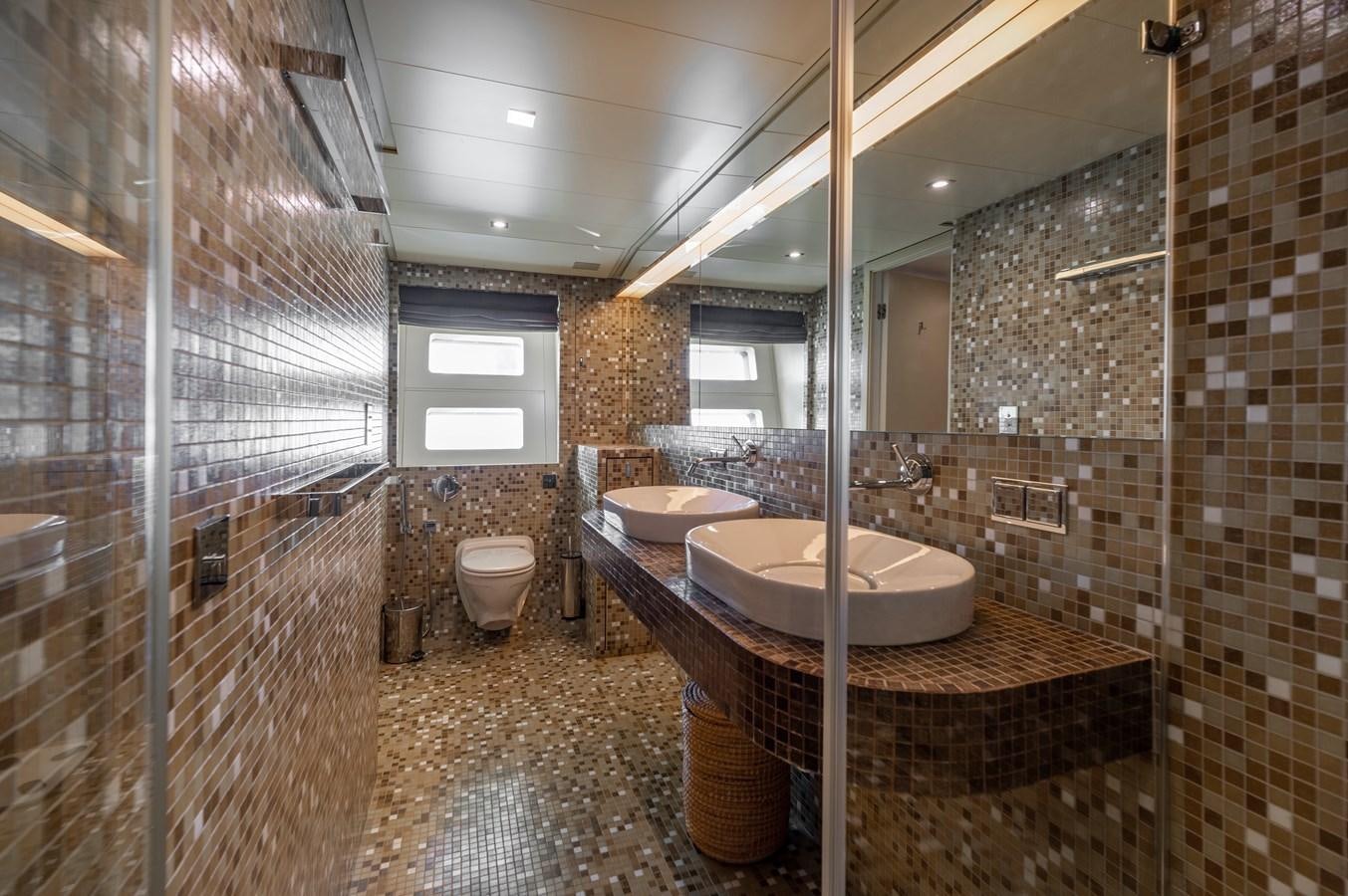 a bathroom with a sink and a toilet aboard BLUE PRINCESS STAR Yacht for Sale
