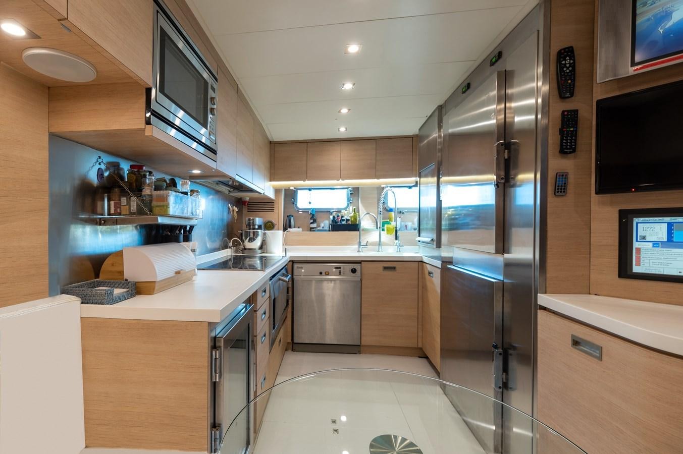 a kitchen with a glass shower aboard BLUE PRINCESS STAR Yacht for Sale
