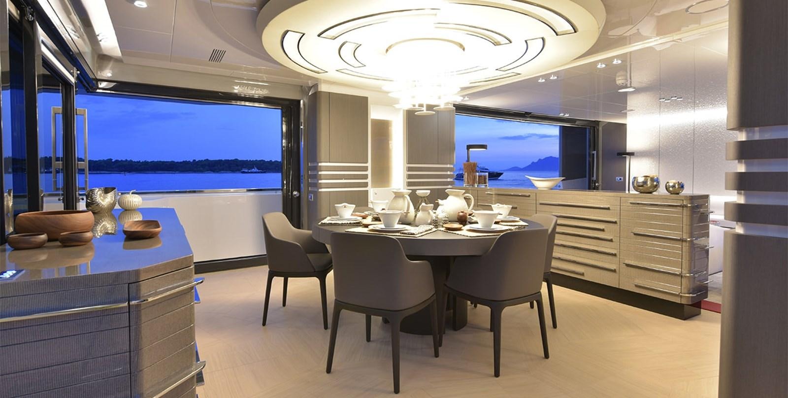 a kitchen with a large island aboard ARIA.S Yacht for Sale